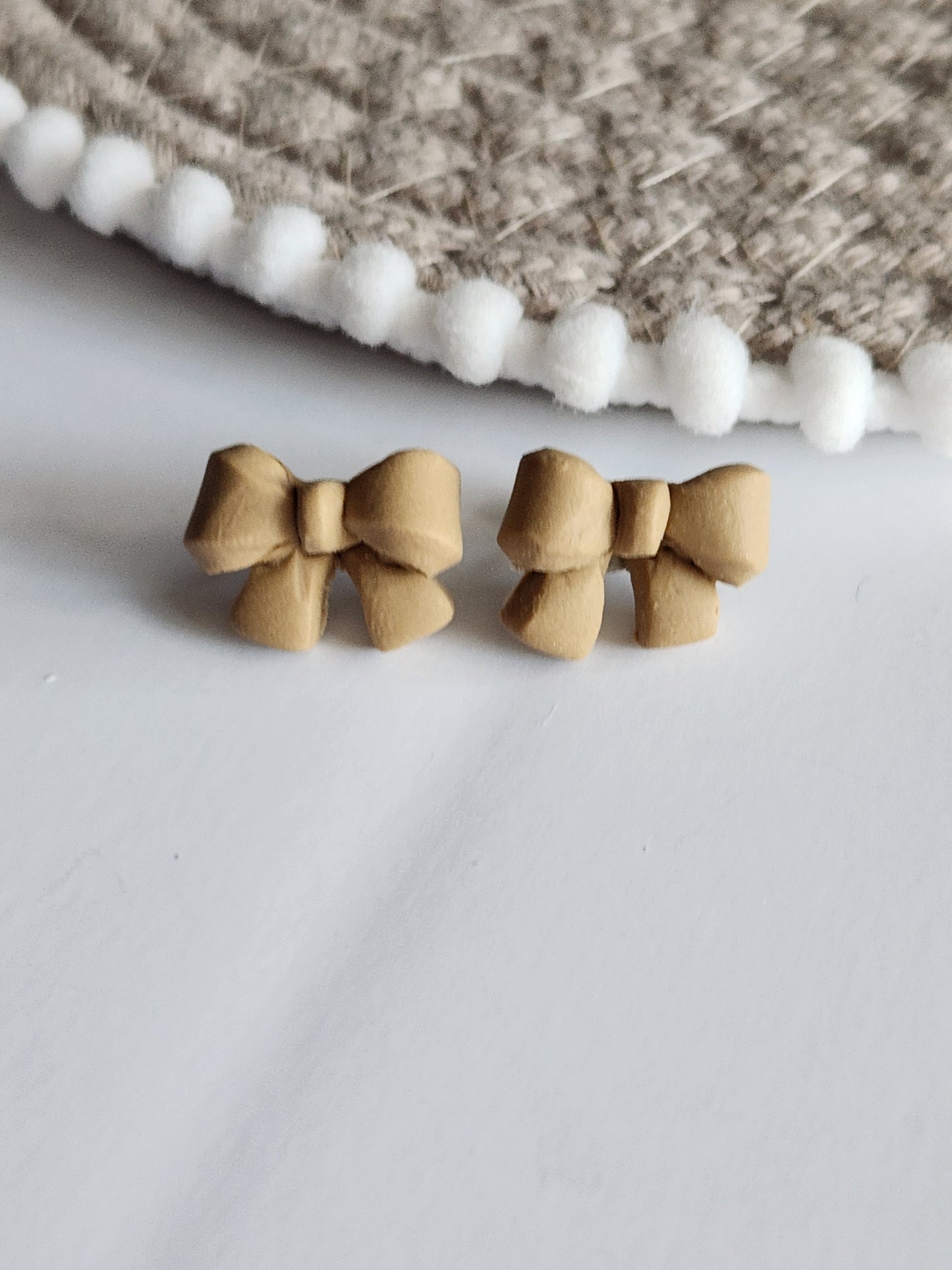 Tan Bow Studs